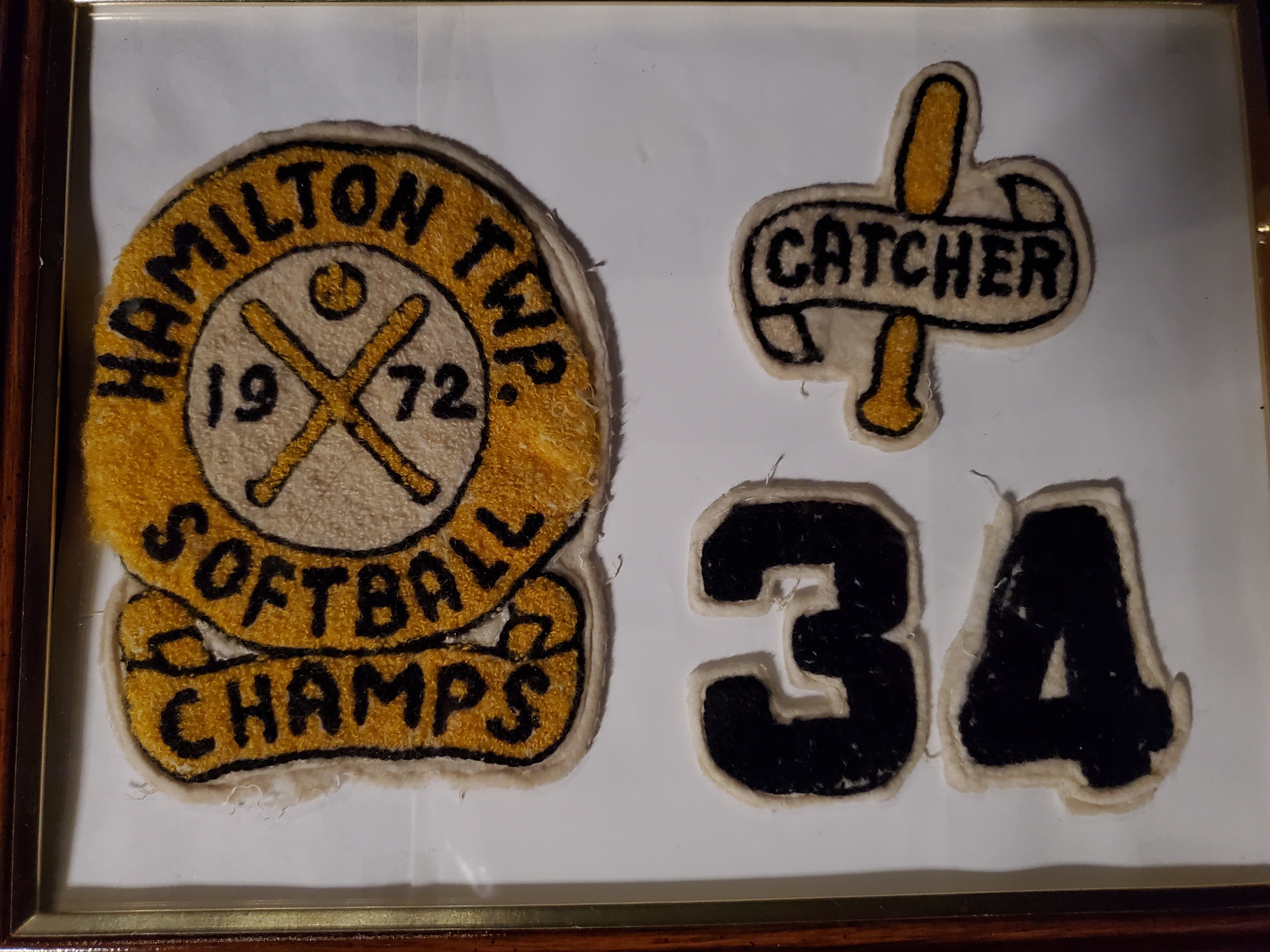 1972 Neil Cane crests in frame 'Hamilton Twp Softball Champs 1972' 'Catcher' '34'