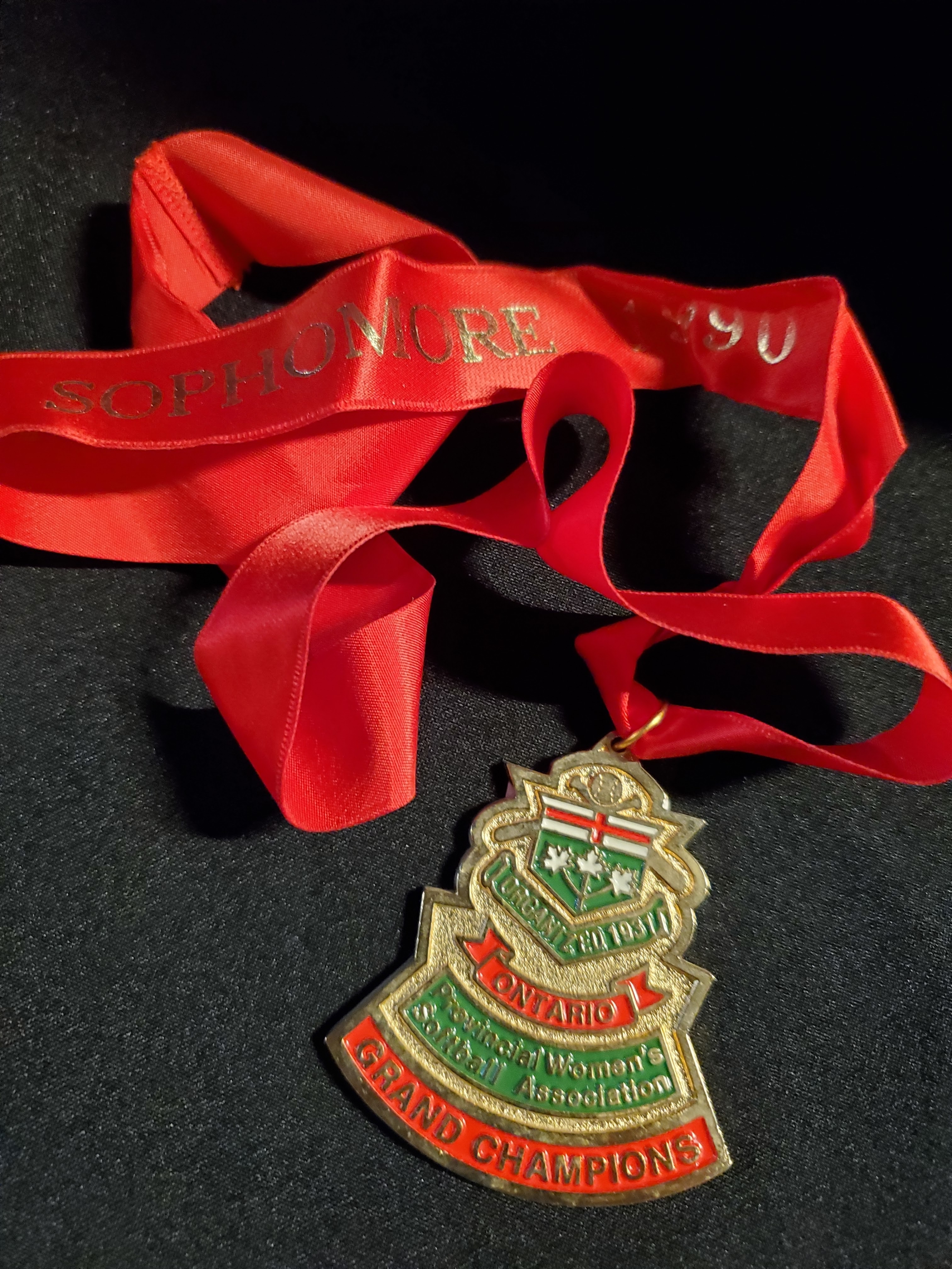 1990 Cobourg Junior Angels gold medallion- red lanyard