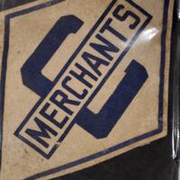 Neil Cane Cobourg Merchants crest 'C Merchants'