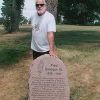2020 Fred Simpson 1878-1945 gravestone photo at Alderville- grandson Dave Mowat standing