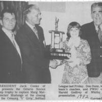 1972 Marg Matthews of Sinclair Mustangs accepts trophy