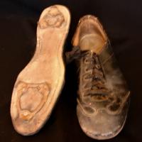 1950 leather ball cleats with metal spikes