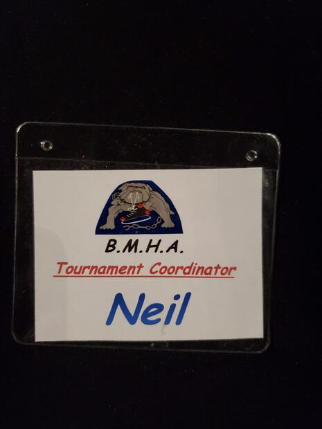 Neil Cane plasticized tag 'Tournament Coordinator"