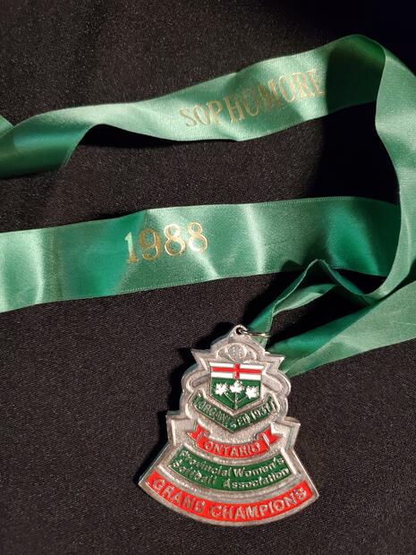 1988 Cobourg Junior Angels silver medallion-green lanyard