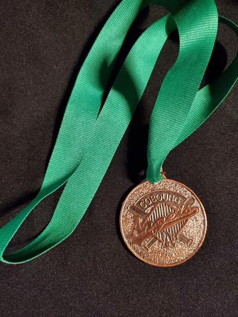 Cobourg Junior Angels softball round bronze medallion "Cobourg Angels A's"- green lanyard