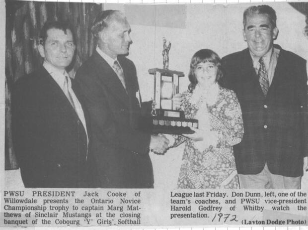 1972 Marg Matthews of Sinclair Mustangs accepts trophy