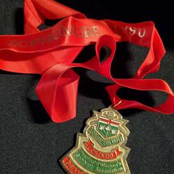 1990 Cobourg Junior Angels gold medallion- red lanyard