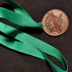 Cobourg Junior Angels softball round bronze medallion "Cobourg Angels A's"- green lanyard