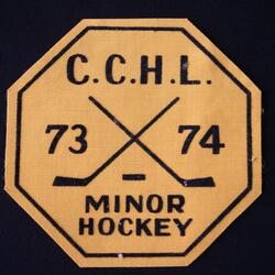 1974 League crest "CCHL Minor Hockey 73-74"