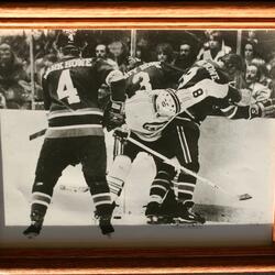 1974 Rod Zane checking Gordie Howe photo